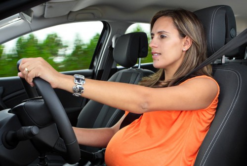 Pregnant Woman Driving a Car